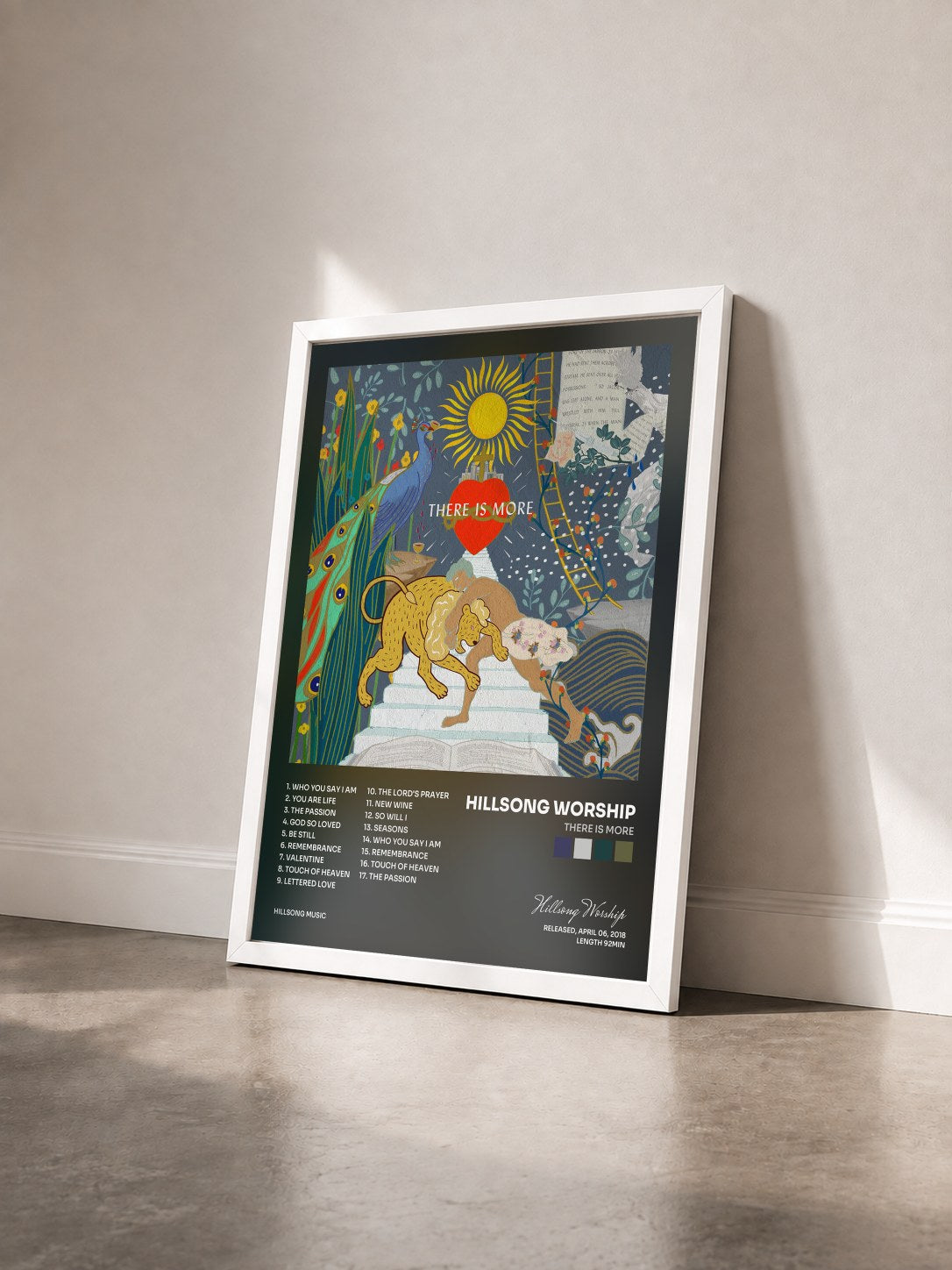#blanc Tableau de l'album There Is More de Hillsong Worship vu de trois quarts, cadre blanc