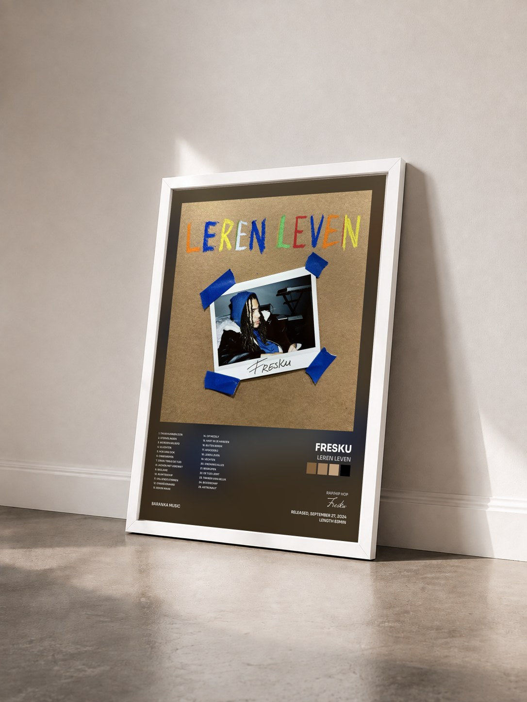 #blanc Tableau de l'album Leren Leven de Fresku vu de trois quarts, cadre blanc