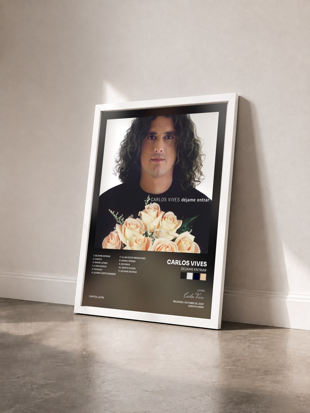 #blanc Tableau de l'album Dejame Entrar de Carlos Vives vu de trois quarts, cadre blanc