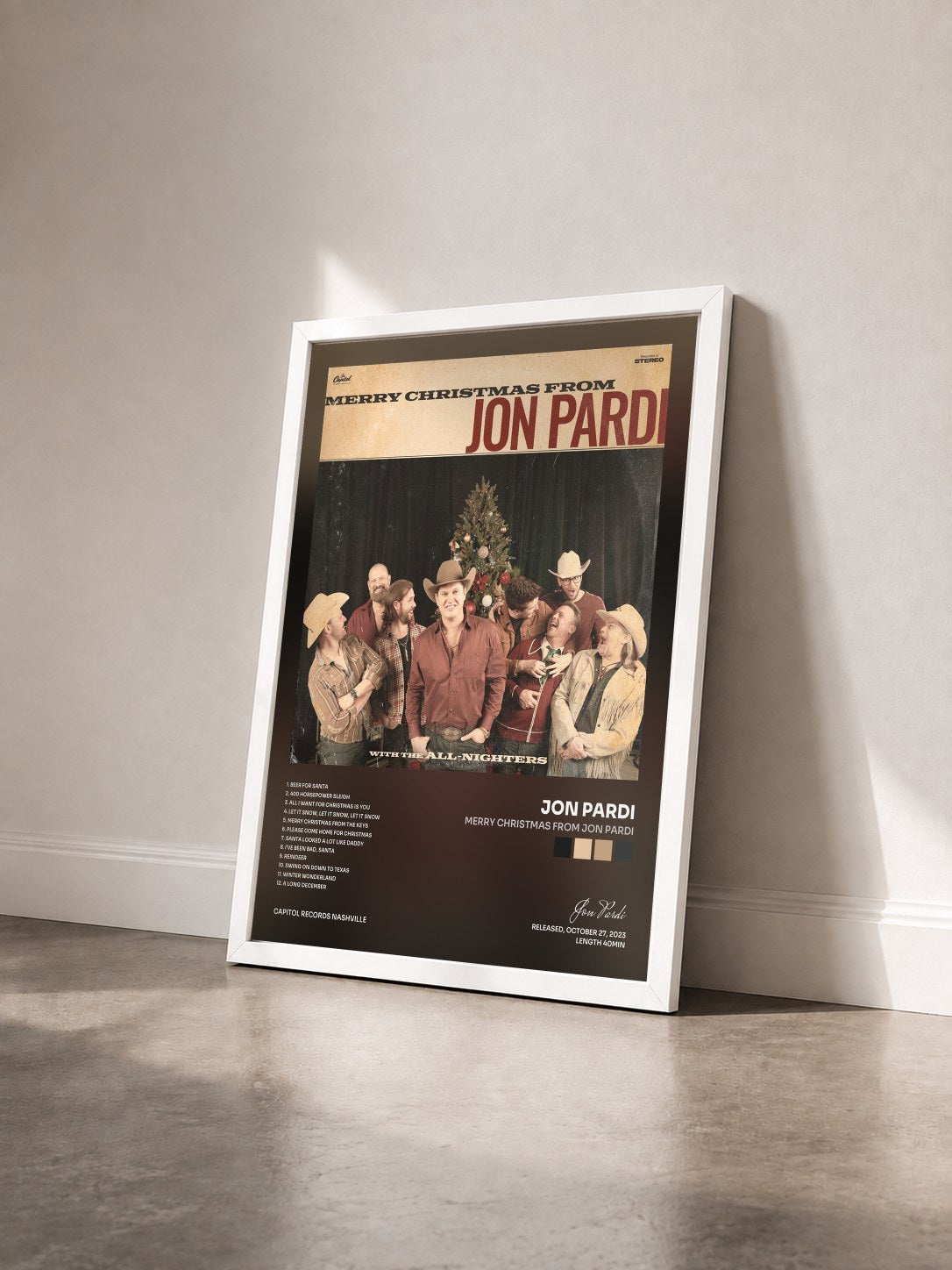 #blanc Tableau de l'album Merry Christmas From Jon Pardi de Jon Pardi vu de trois quarts, cadre blanc