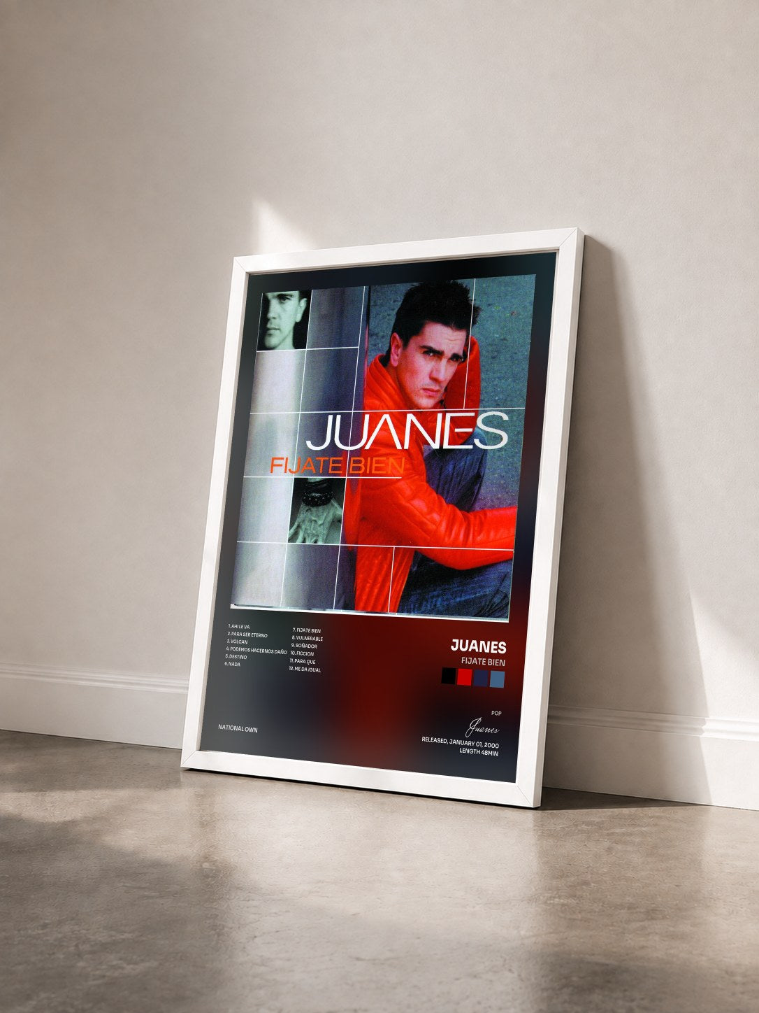 #blanc Tableau de l'album Fijate Bien de Juanes vu de trois quarts, cadre blanc