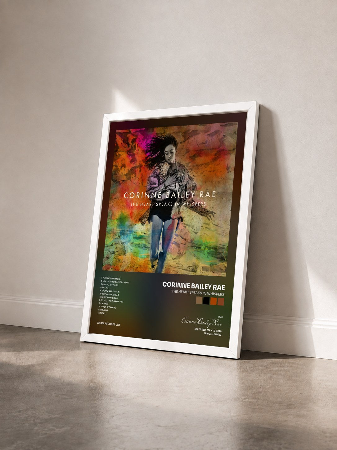 #blanc Tableau de l'album The Heart Speaks In Whispers de Corinne Bailey Rae vu de trois quarts, cadre blanc