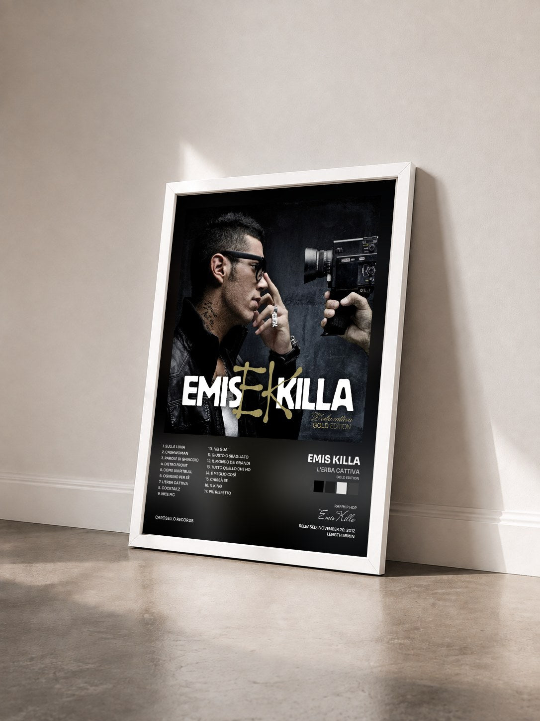 #blanc Tableau de l'album L'erba cattiva (Gold Edition) de Emis Killa vu de trois quarts, cadre blanc