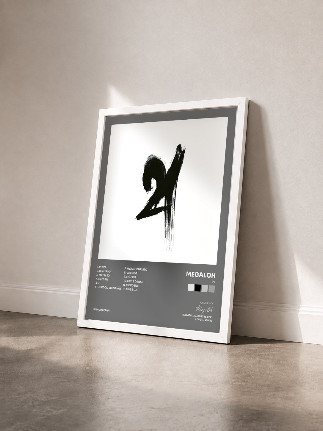 #blanc Tableau de l'album 21 de Megaloh vu de trois quarts, cadre blanc