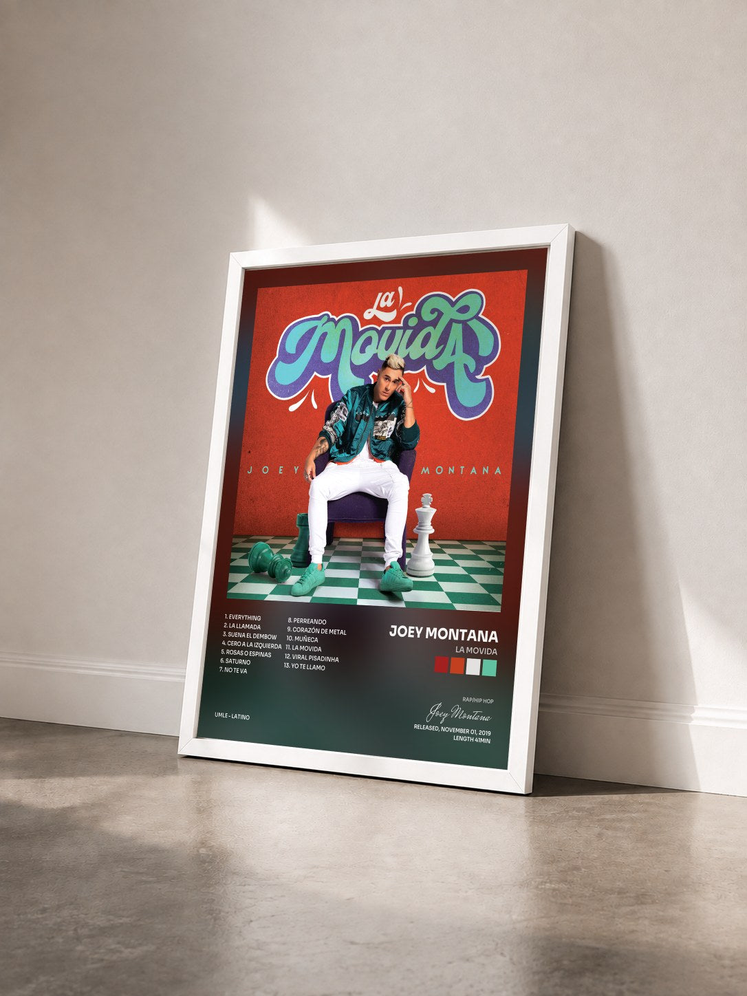 #blanc Tableau de l'album La Movida de Joey Montana vu de trois quarts, cadre blanc