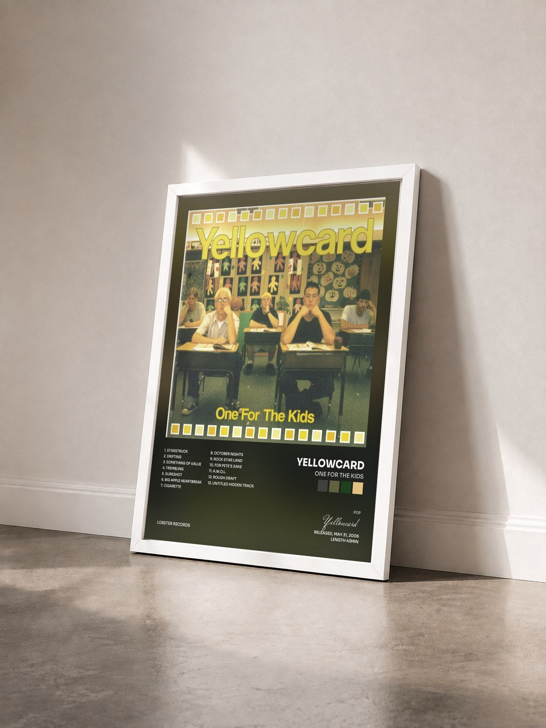 #blanc Tableau de l'album One for the Kids de Yellowcard vu de trois quarts, cadre blanc