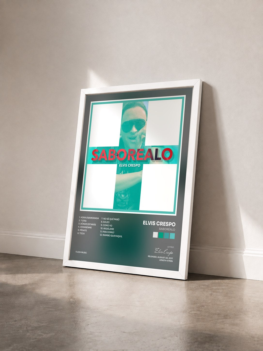#blanc Tableau de l'album Saboréalo de Elvis Crespo vu de trois quarts, cadre blanc