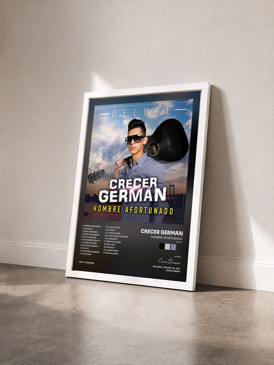 #blanc Tableau de l'album Hombre Afortunado (Deluxe) de Crecer German vu de trois quarts, cadre blanc