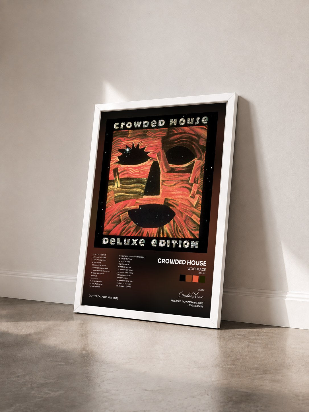 #blanc Tableau de l'album Woodface (Deluxe) de Crowded House vu de trois quarts, cadre blanc