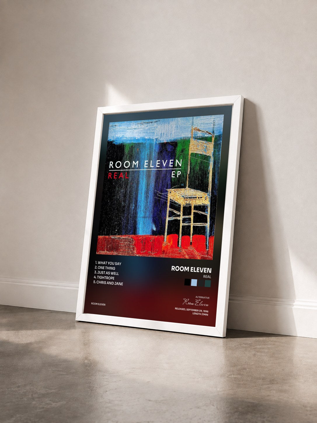 #blanc Tableau de l'album Real de Room Eleven vu de trois quarts, cadre blanc
