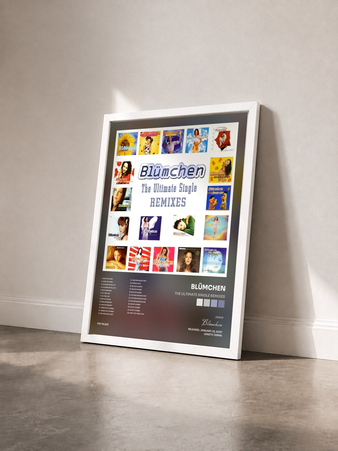#blanc Tableau de l'album The Ultimate Single Remixes de Blümchen vu de trois quarts, cadre blanc