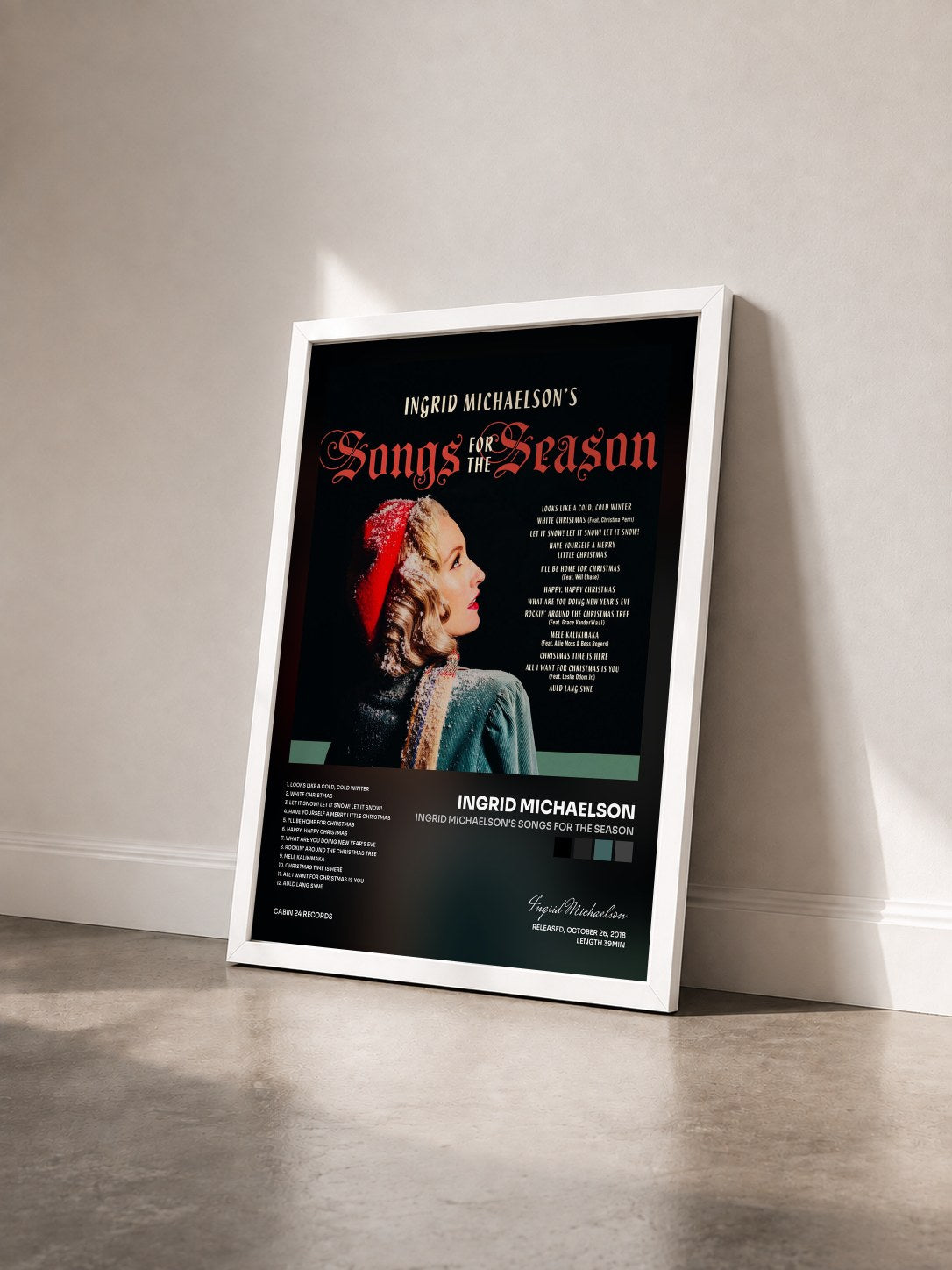 #blanc Tableau de l'album Ingrid Michaelson's Songs For The Season de Ingrid Michaelson vu de trois quarts, cadre blanc