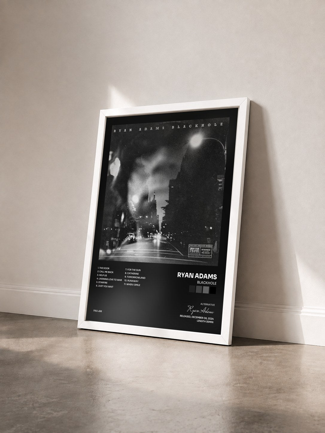 #blanc Tableau de l'album BLACKHOLE de Ryan Adams vu de trois quarts, cadre blanc