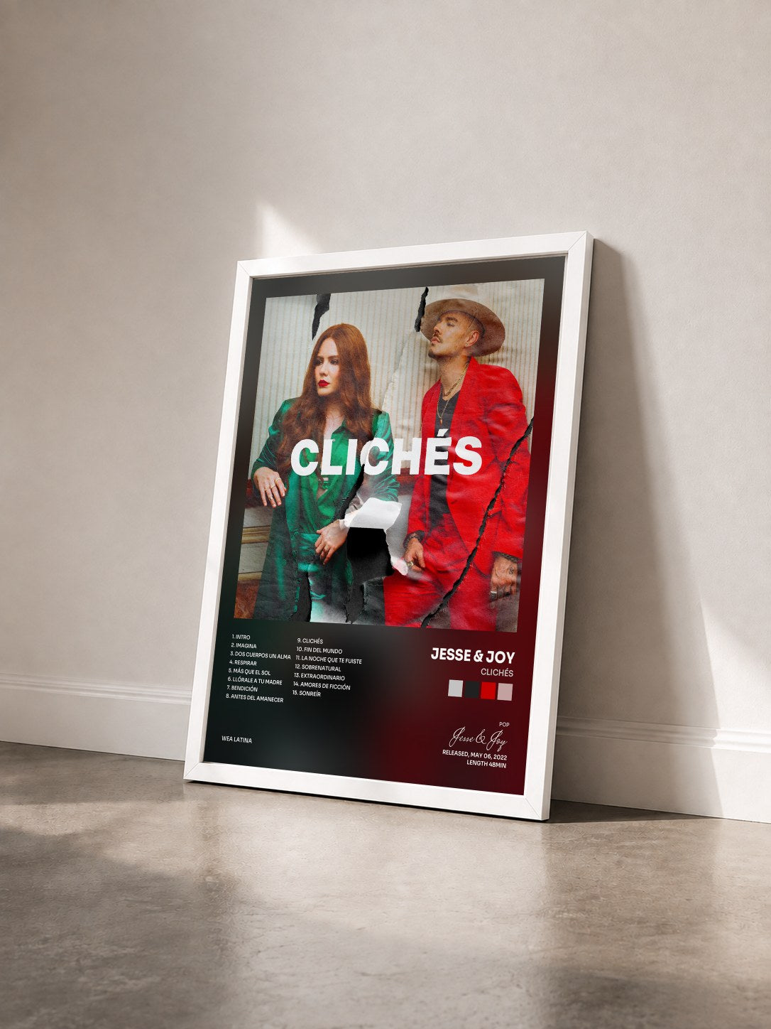 #blanc Tableau de l'album Clichés de Jesse & Joy vu de trois quarts, cadre blanc