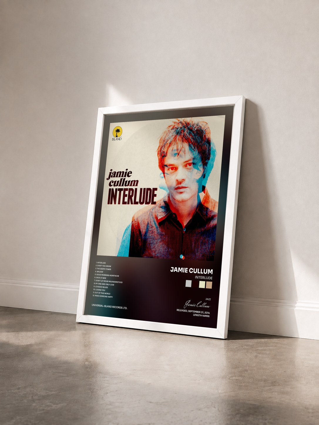 #blanc Tableau de l'album Interlude de Jamie Cullum vu de trois quarts, cadre blanc
