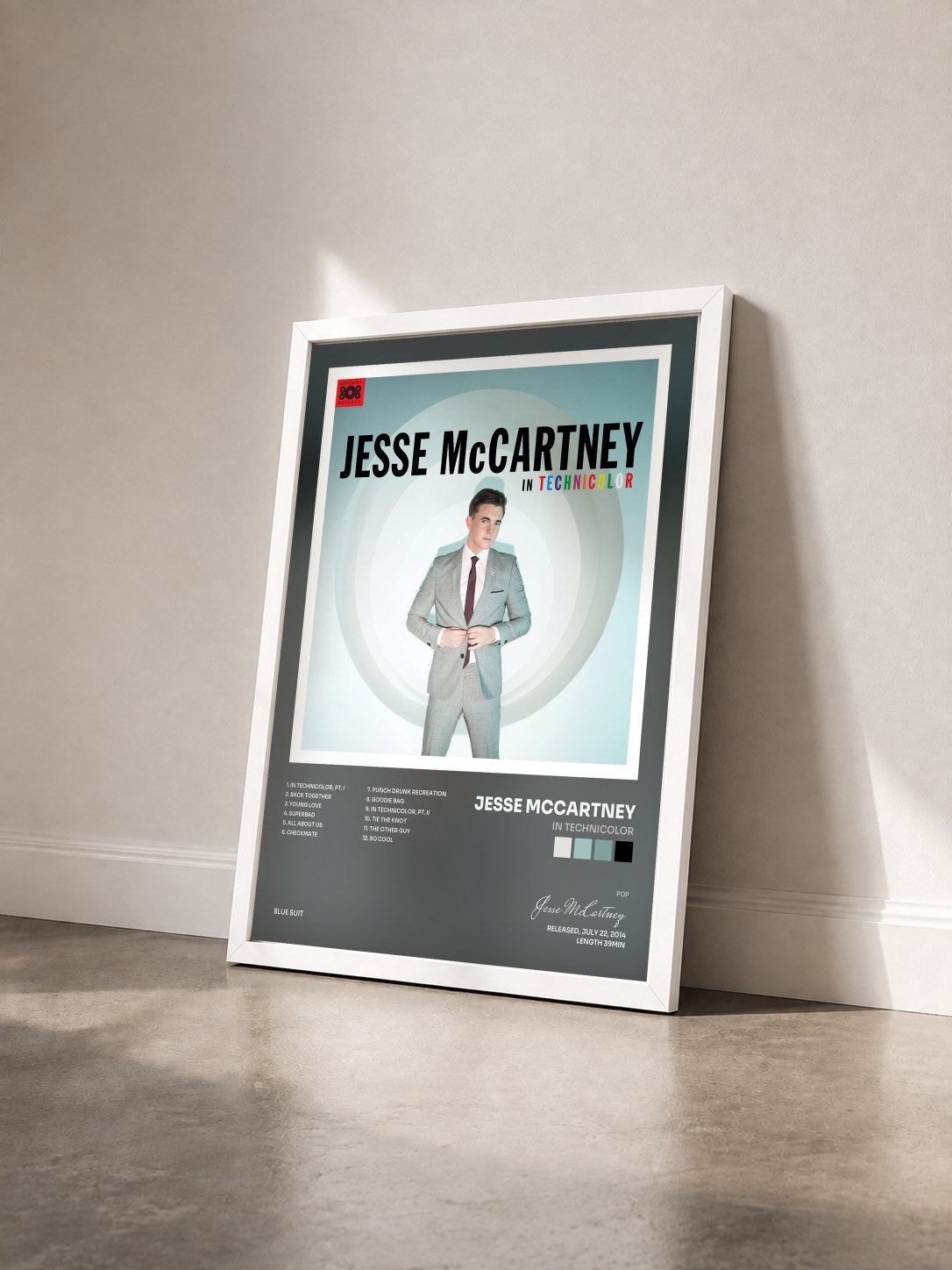 #blanc Tableau de l'album In Technicolor de Jesse McCartney vu de trois quarts, cadre blanc