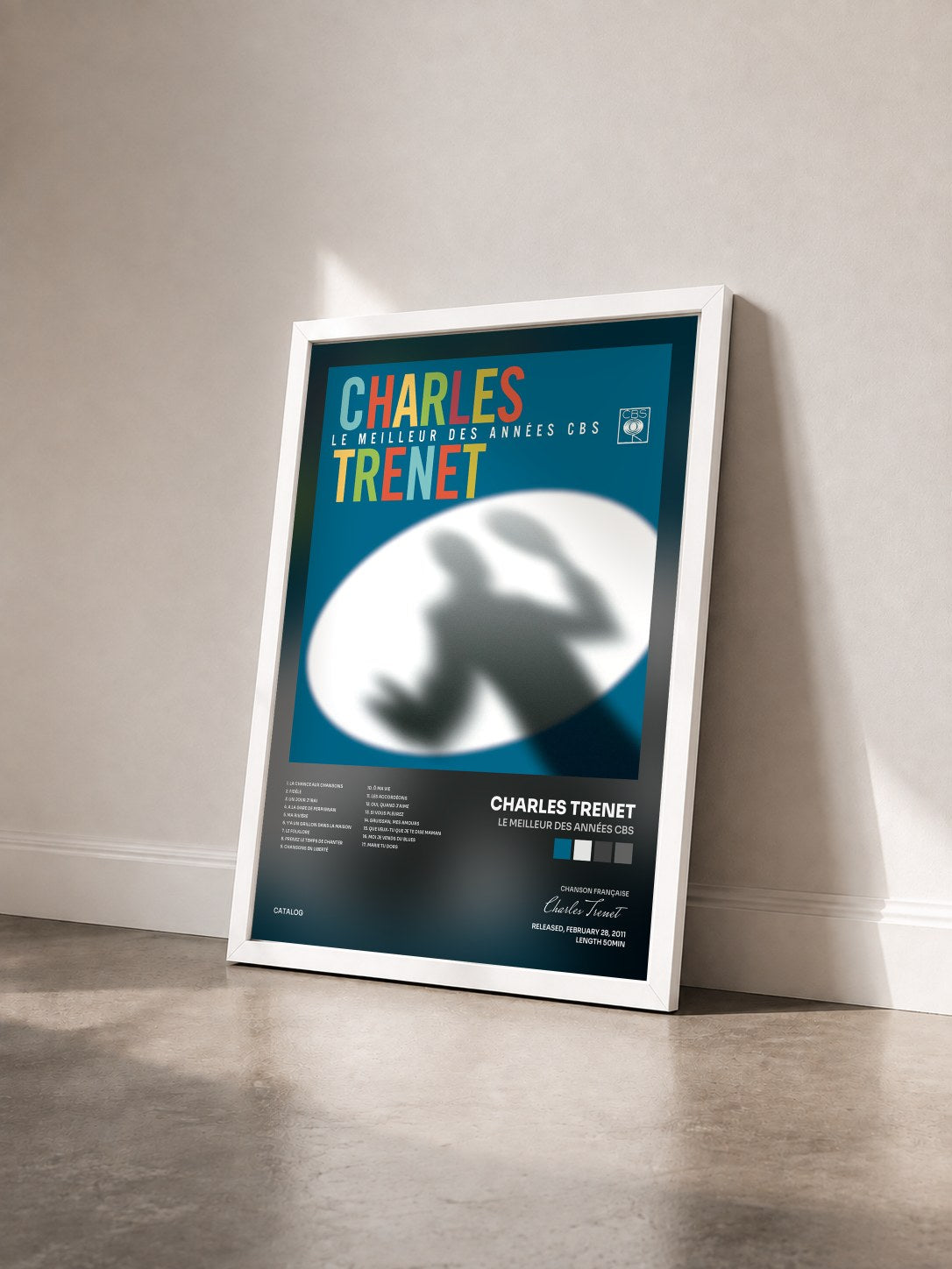#blanc Tableau de l'album Le meilleur des années CBS de Charles Trenet vu de trois quarts, cadre blanc