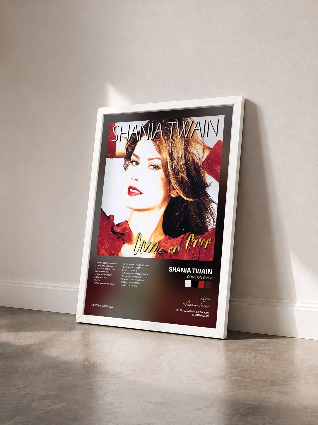 #blanc Tableau de l'album Come On Over de Shania Twain vu de trois quarts, cadre blanc