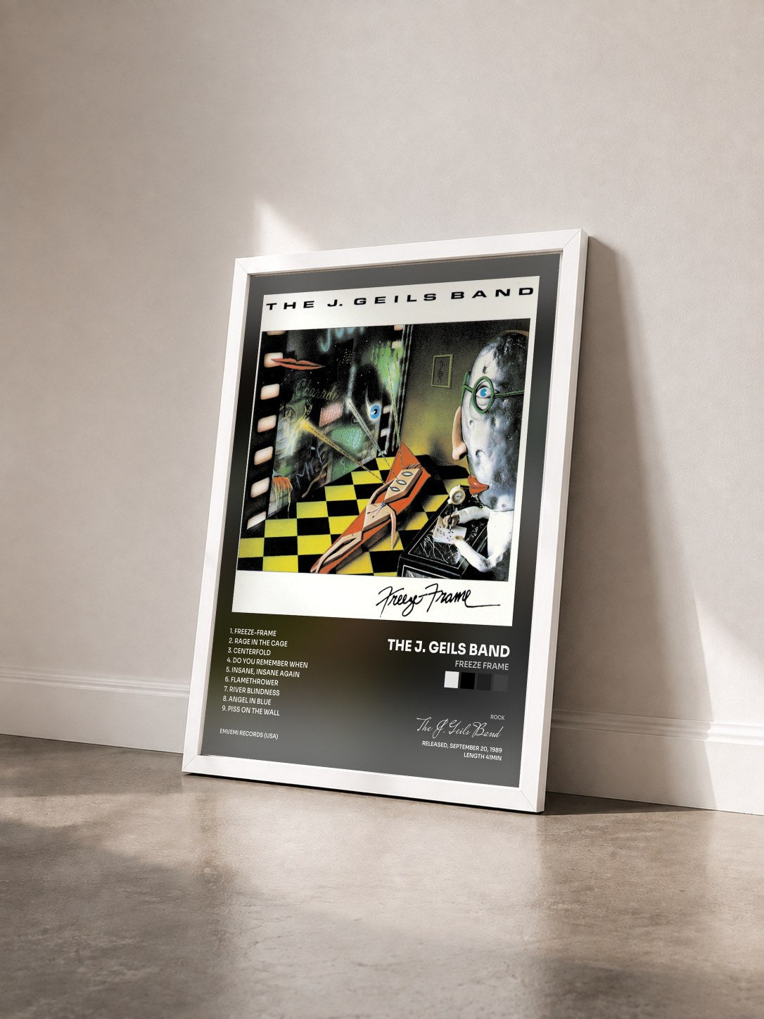 #blanc Tableau de l'album Freeze Frame de The J. Geils Band vu de trois quarts, cadre blanc