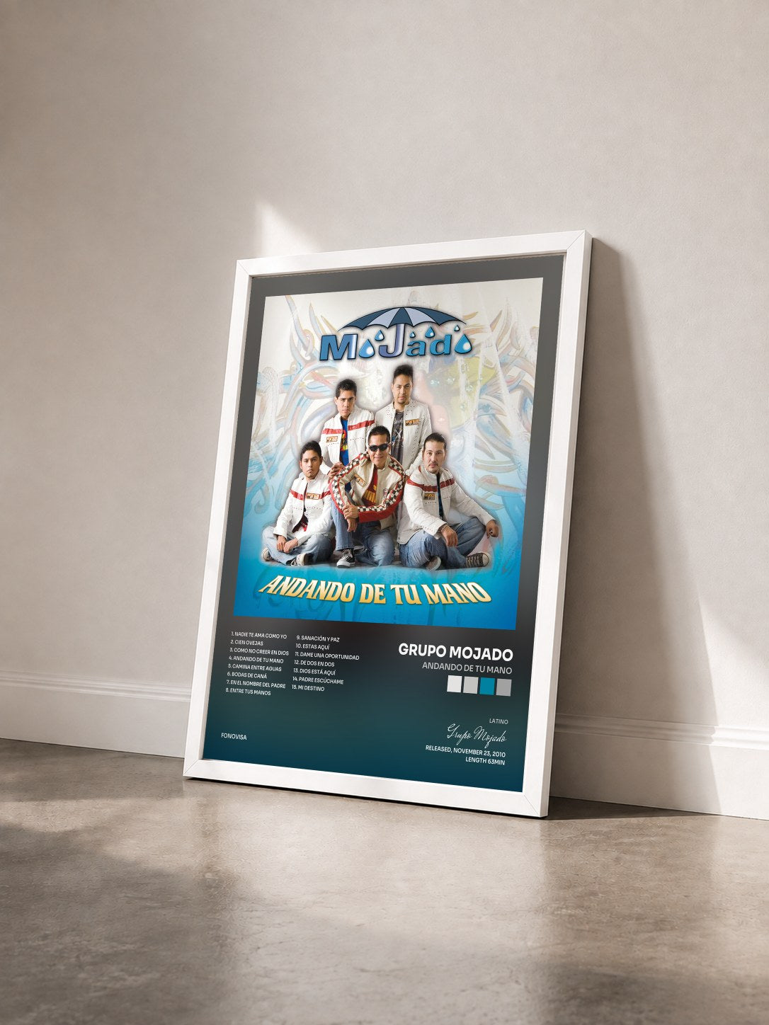 #blanc Tableau de l'album Andando De Tu Mano de Grupo Mojado vu de trois quarts, cadre blanc