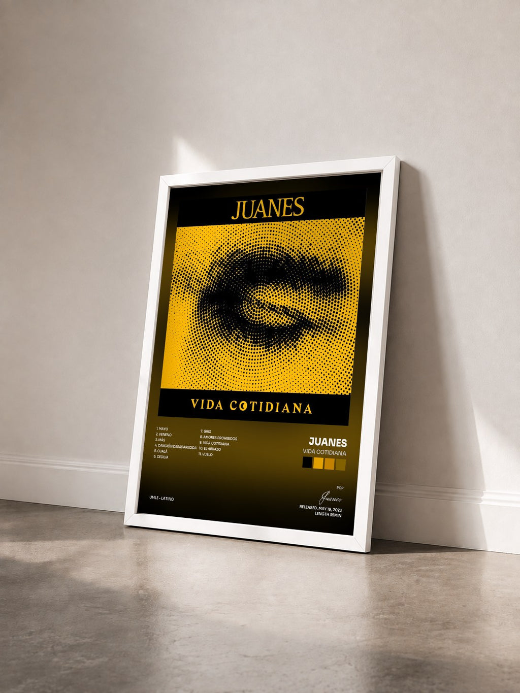 #blanc Tableau de l'album Vida Cotidiana de Juanes vu de trois quarts, cadre blanc