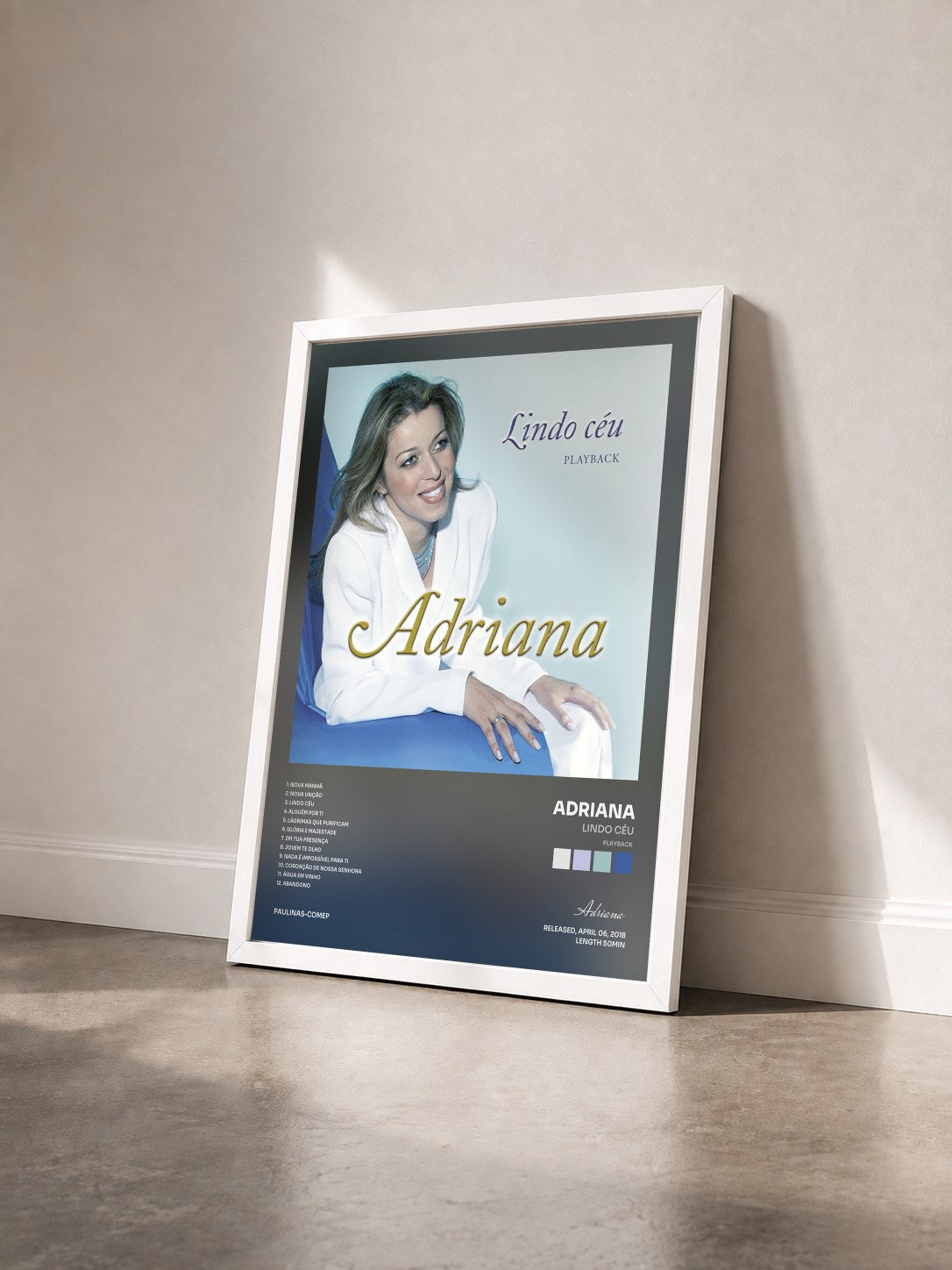 #blanc Tableau de l'album Lindo Céu (Playback) de Adriana vu de trois quarts, cadre blanc
