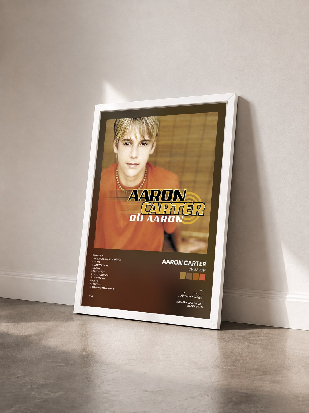 #blanc Tableau de l'album Oh Aaron de Aaron Carter vu de trois quarts, cadre blanc