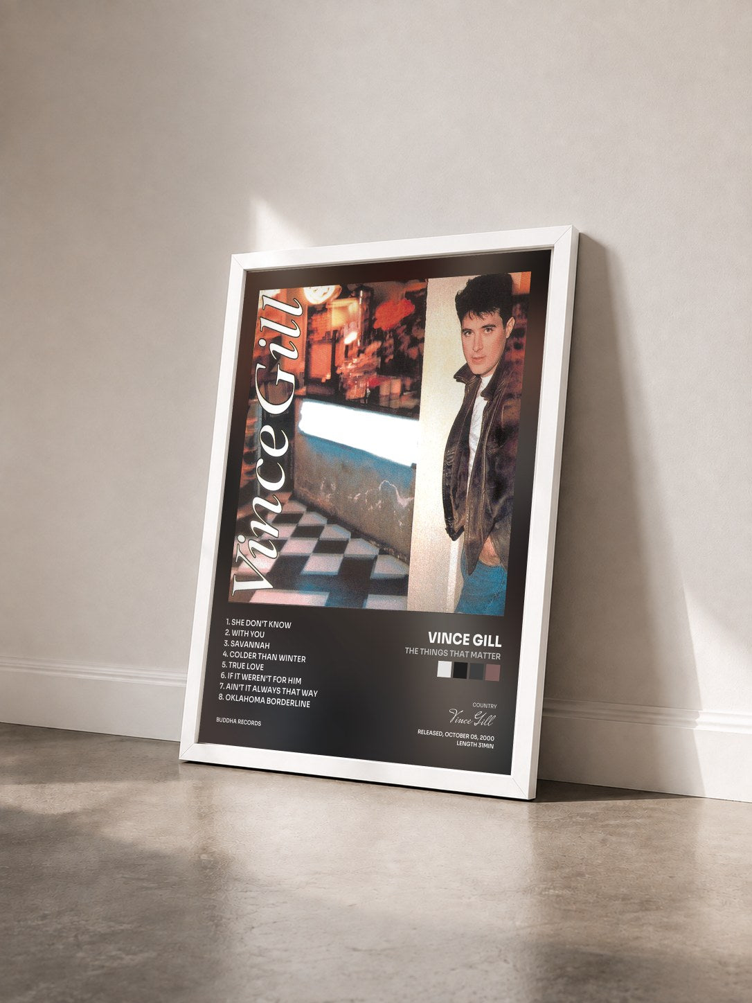 #blanc Tableau de l'album The Things That Matter de Vince Gill vu de trois quarts, cadre blanc
