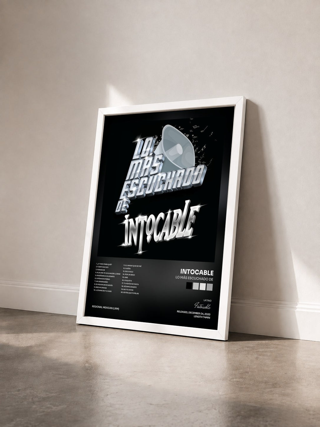 #blanc Lo Más Escuchado De by Intocable as a framed art print seen at an angle, white frame