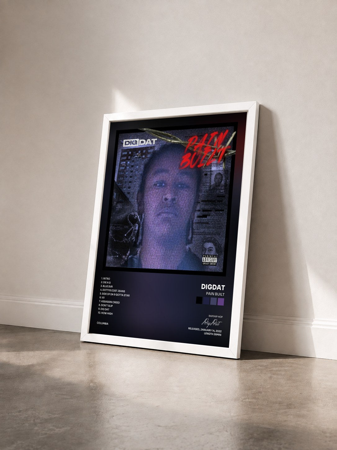 #blanc Tableau de l'album Pain Built de DigDat vu de trois quarts, cadre blanc
