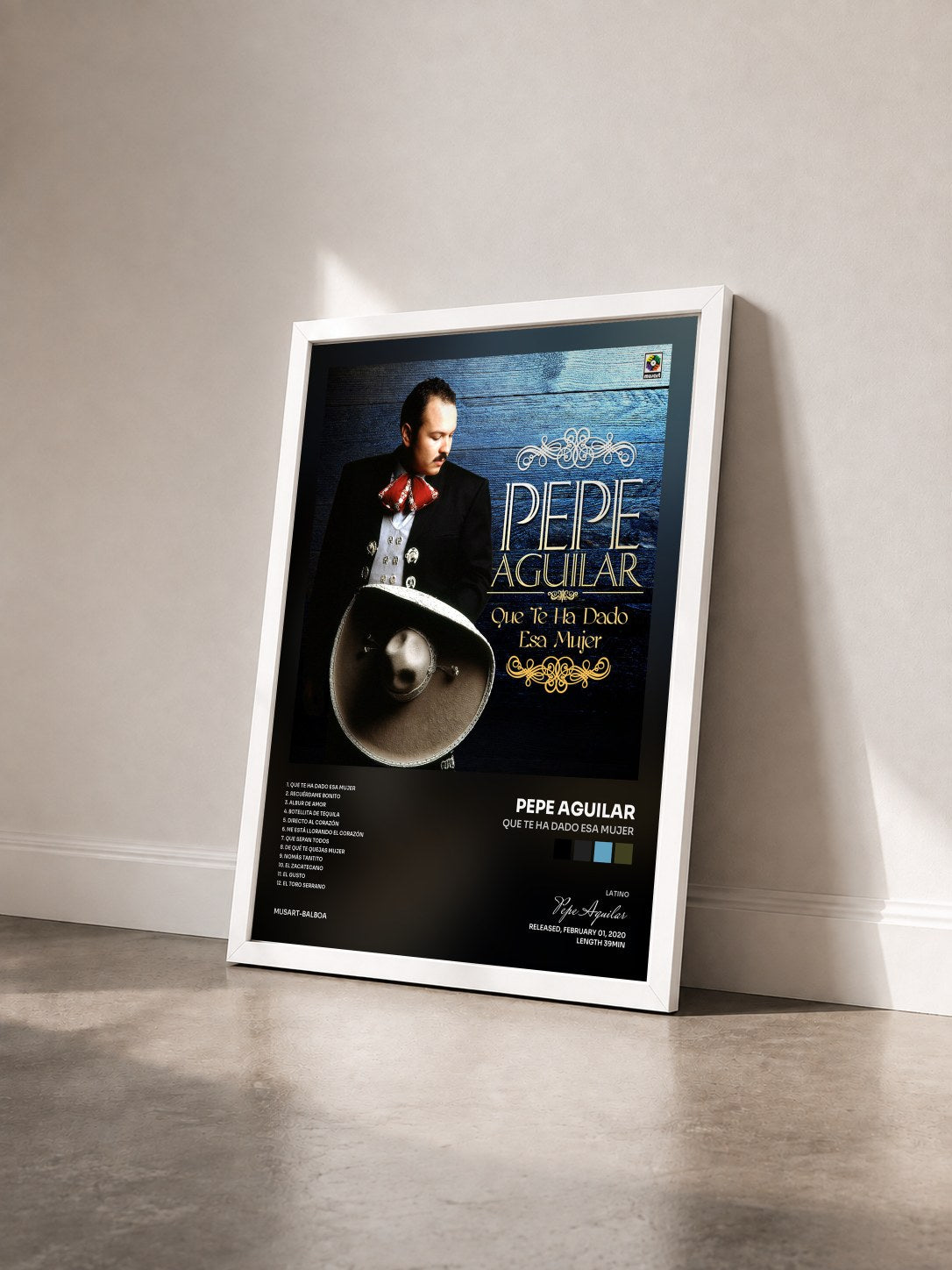 #blanc Tableau de l'album Que Te Ha Dado Esa Mujer de Pepe Aguilar vu de trois quarts, cadre blanc