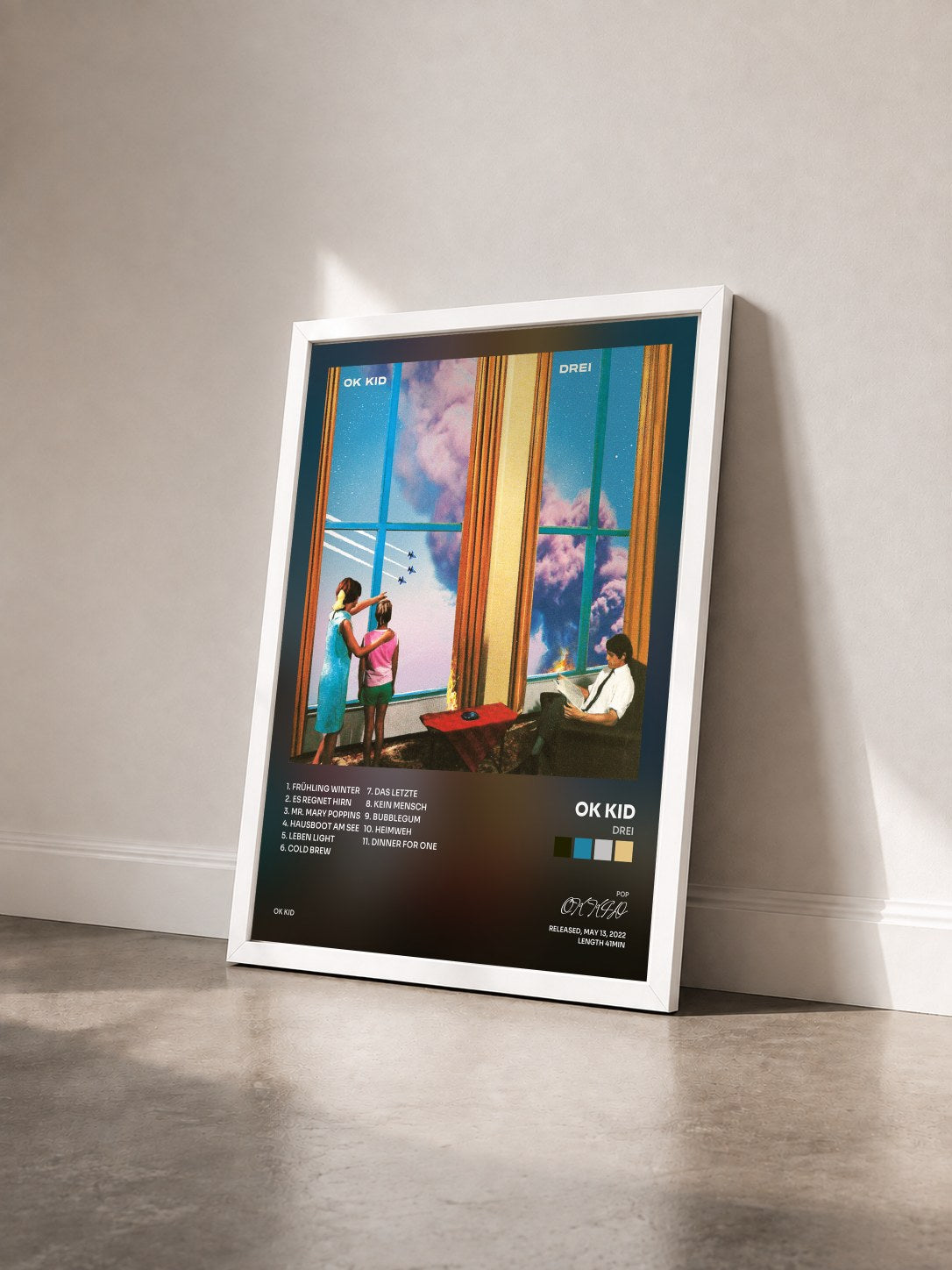#blanc Tableau de l'album DREI de OK KID vu de trois quarts, cadre blanc