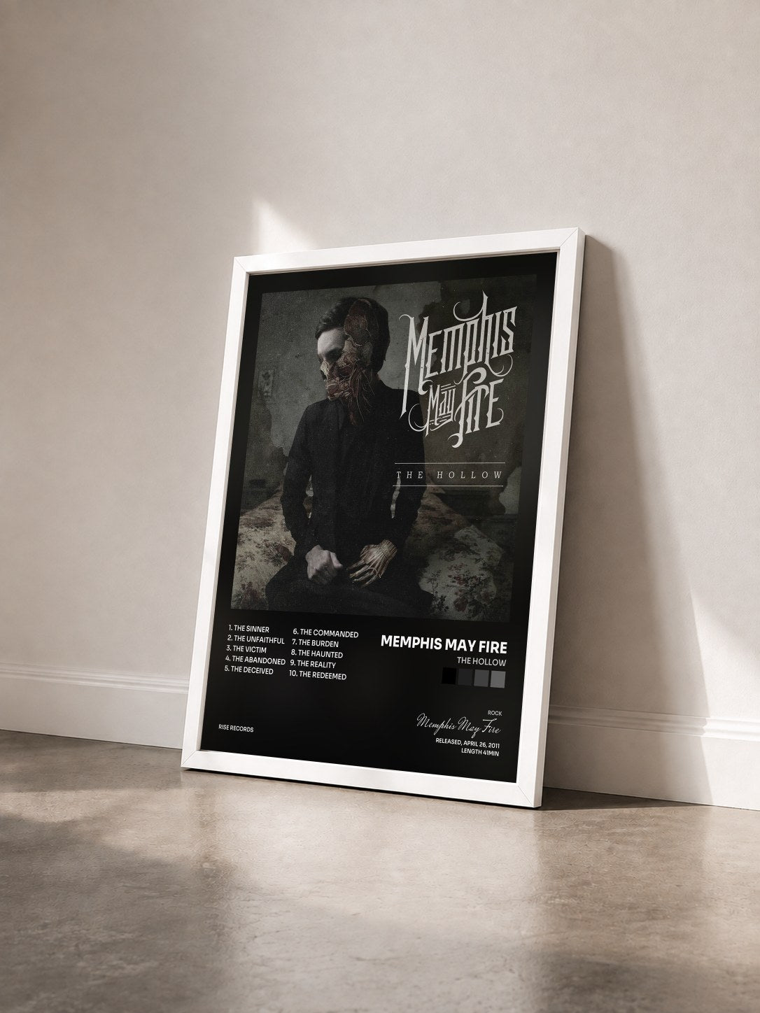 #blanc Tableau de l'album The Hollow de Memphis May Fire vu de trois quarts, cadre blanc