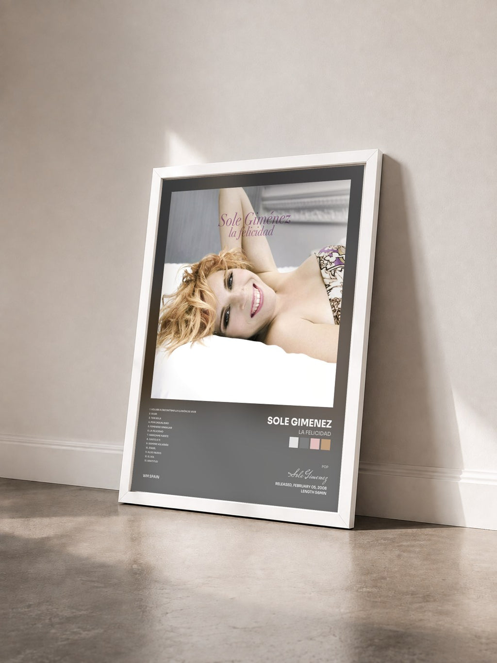 #blanc Tableau de l'album La felicidad de Sole Gimenez vu de trois quarts, cadre blanc
