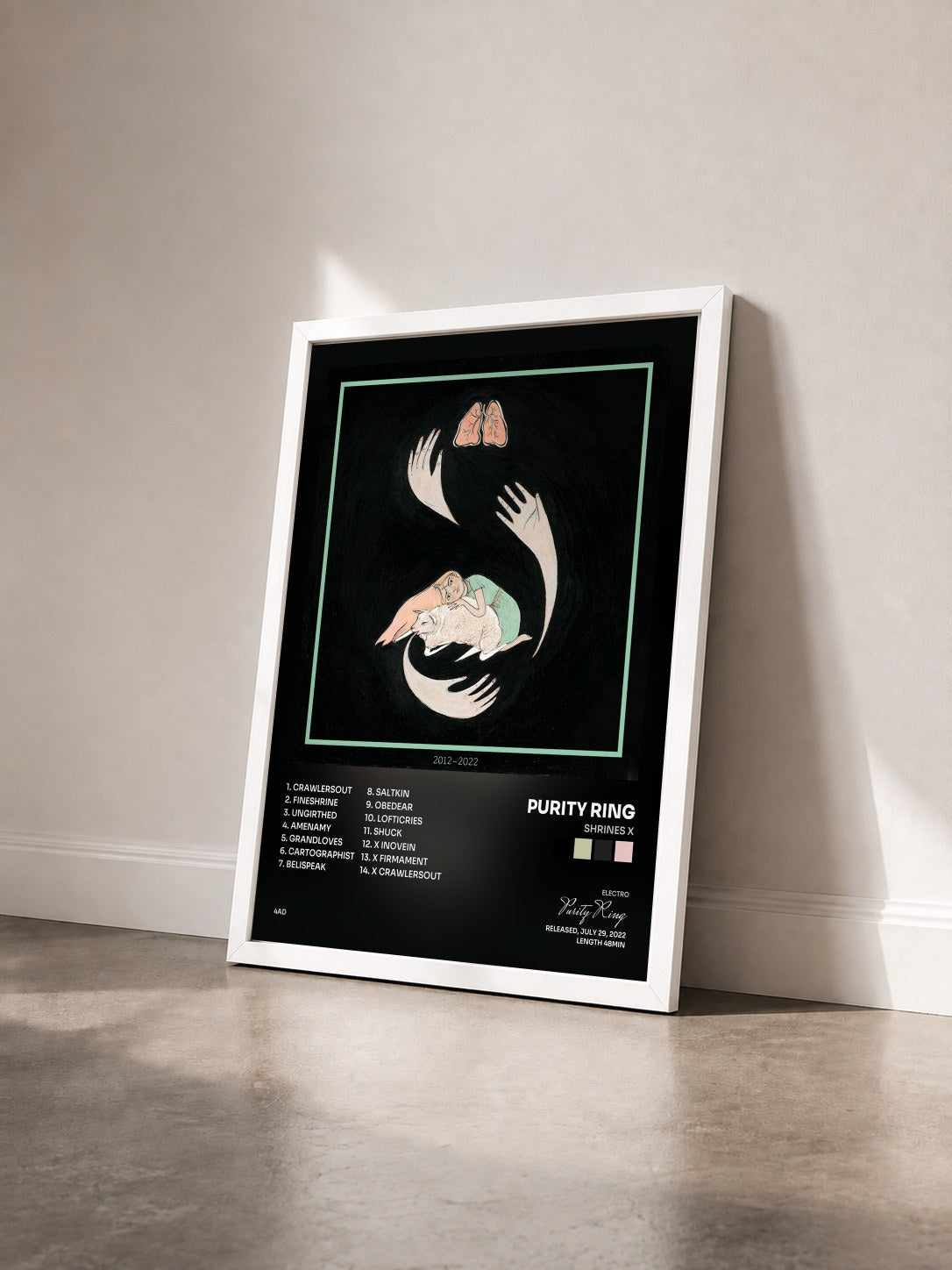 #blanc Tableau de l'album shrines X de Purity Ring vu de trois quarts, cadre blanc