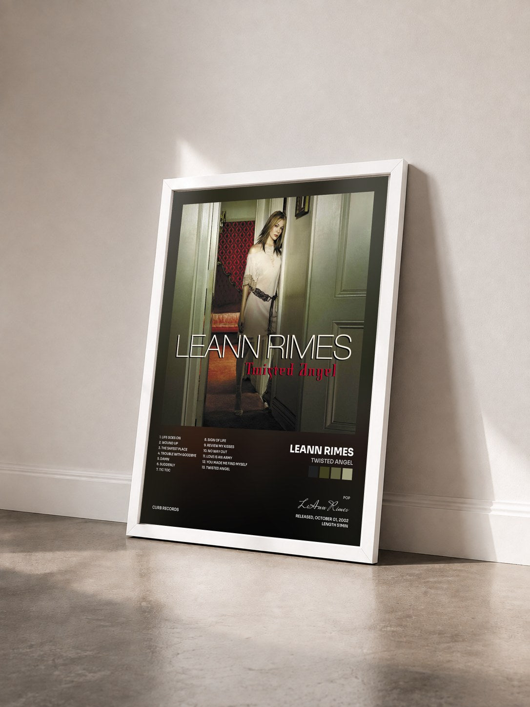 #blanc Tableau de l'album Twisted Angel de LeAnn Rimes vu de trois quarts, cadre blanc