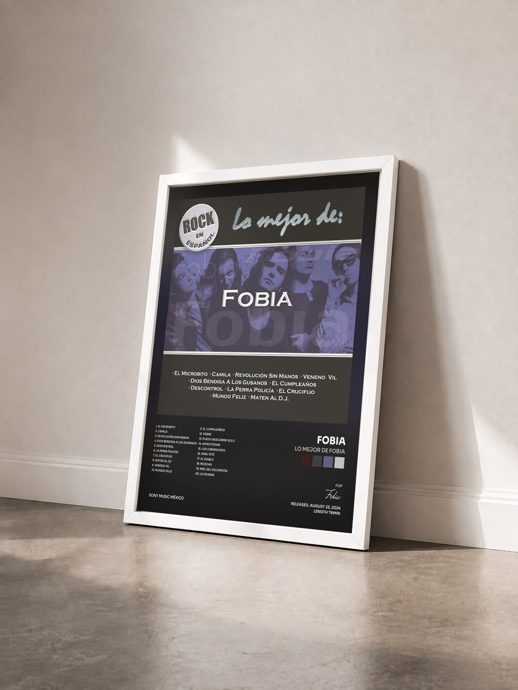 #blanc Lo Mejor by Fobia de Fobia as a framed art print seen at an angle, white frame