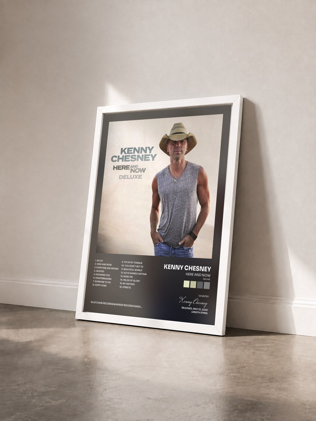 #blanc Tableau de l'album Here And Now (Deluxe) de Kenny Chesney vu de trois quarts, cadre blanc