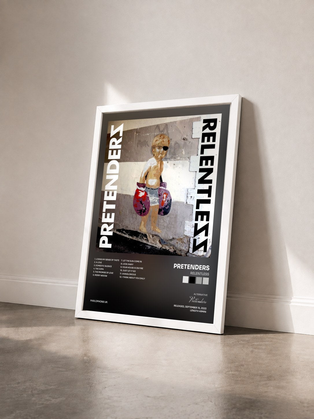 #blanc Tableau de l'album Relentless de Pretenders vu de trois quarts, cadre blanc