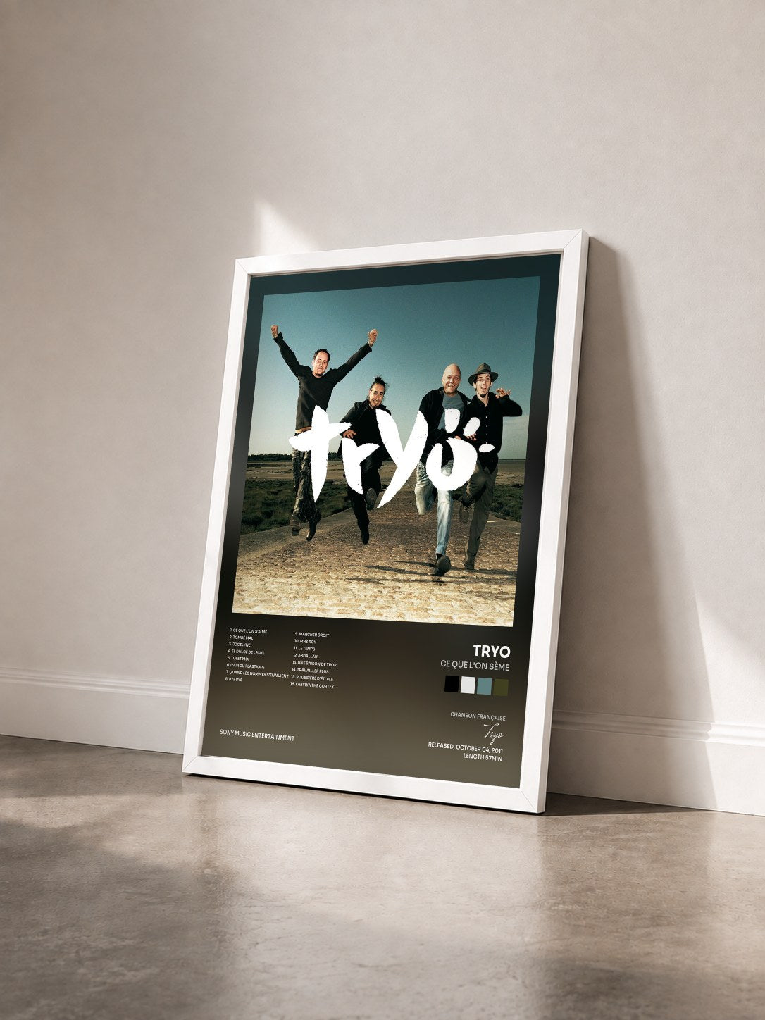 #blanc Tableau de l'album Ce que l'on sème de Tryo vu de trois quarts, cadre blanc