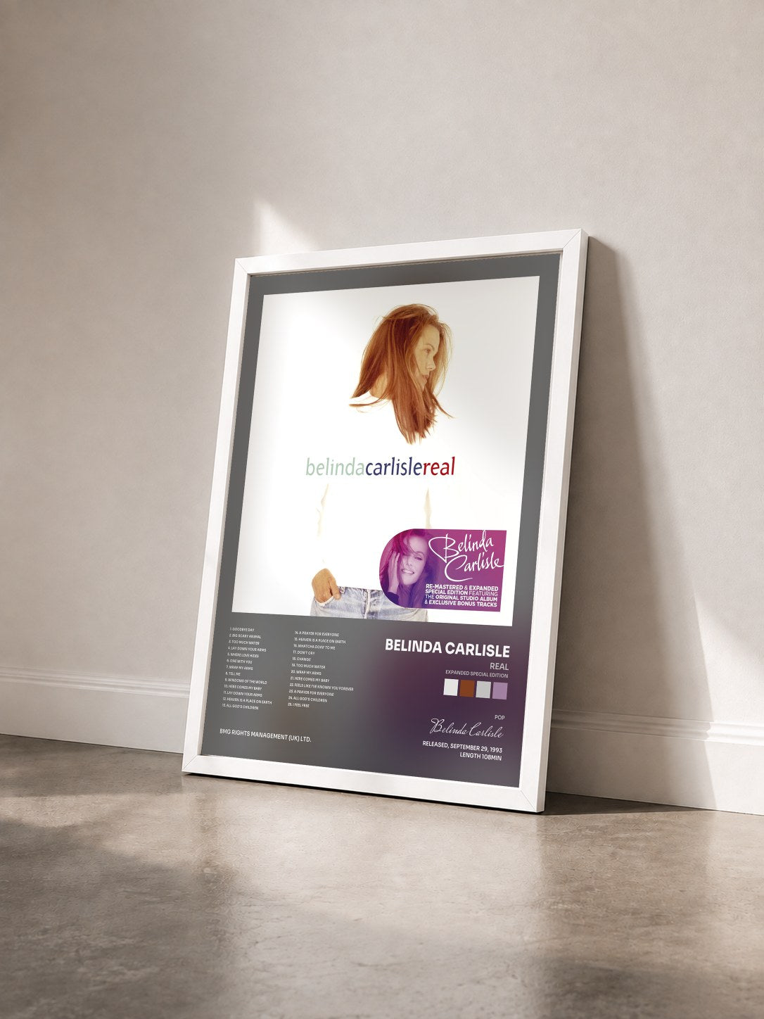 #blanc Tableau de l'album Real (Expanded Special Edition) de Belinda Carlisle vu de trois quarts, cadre blanc