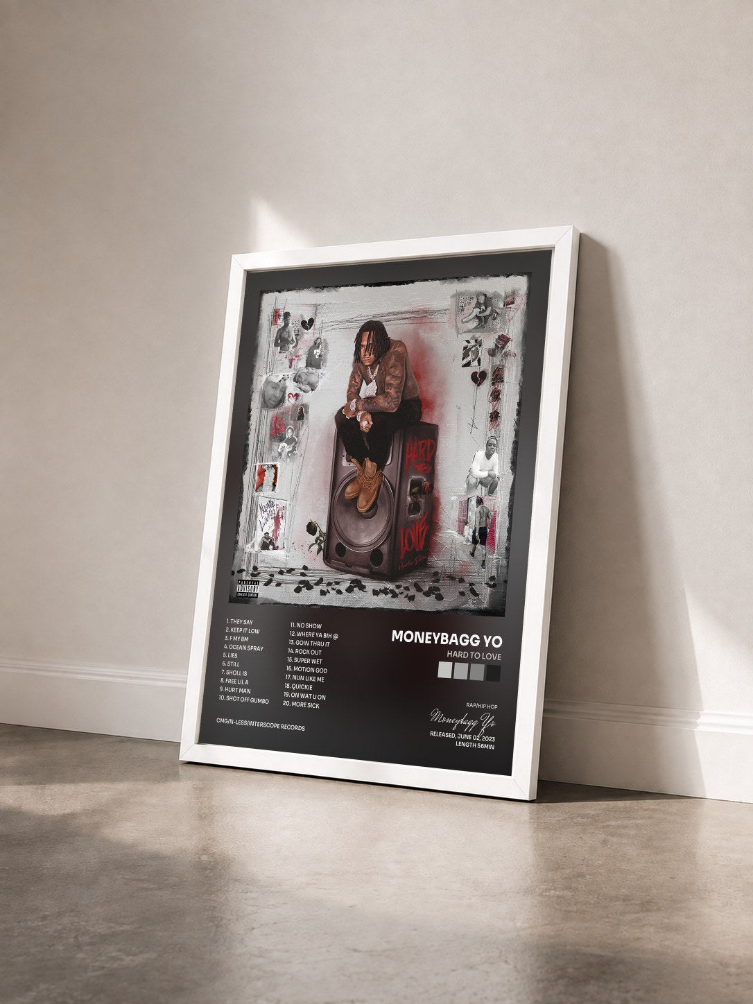 #blanc Tableau de l'album Hard To Love de Moneybagg Yo vu de trois quarts, cadre blanc
