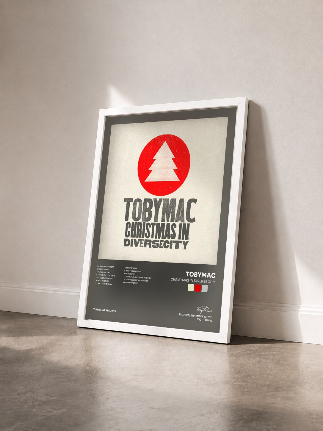 #blanc Tableau de l'album Christmas in Diverse City de tobyMac vu de trois quarts, cadre blanc