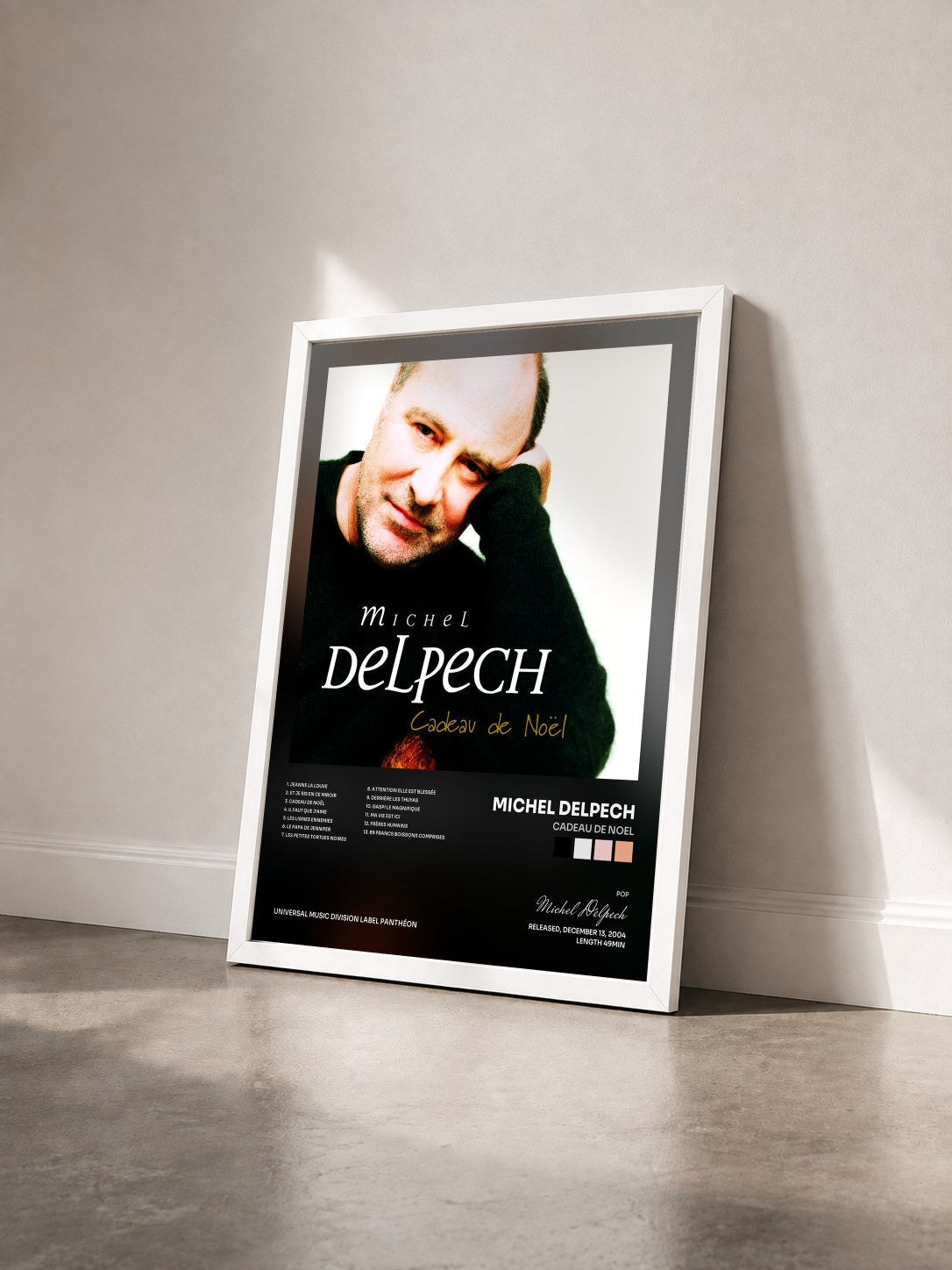 #blanc Tableau de l'album Cadeau De Noel de Michel Delpech vu de trois quarts, cadre blanc