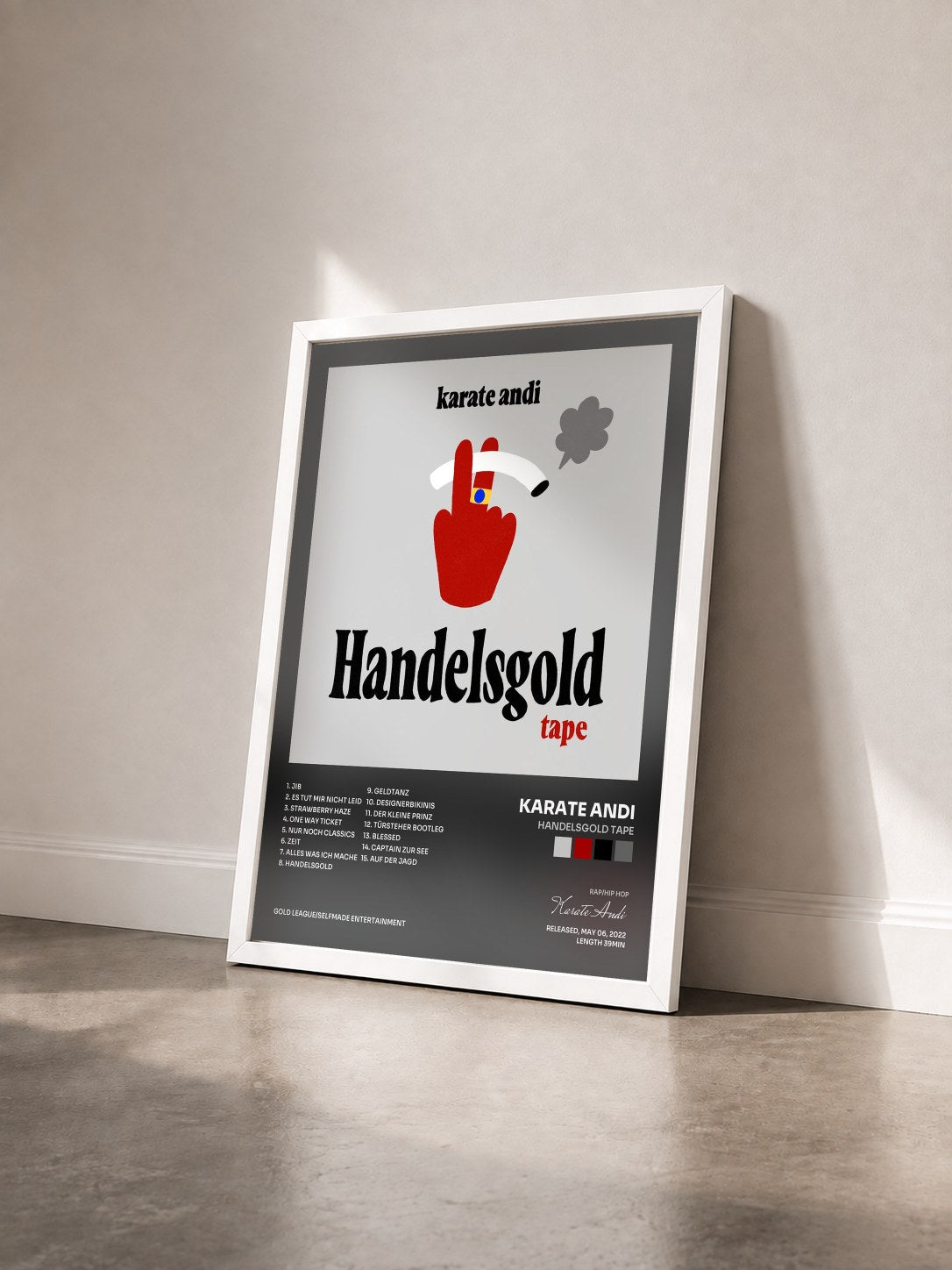 #blanc Tableau de l'album Handelsgold Tape de Karate Andi vu de trois quarts, cadre blanc