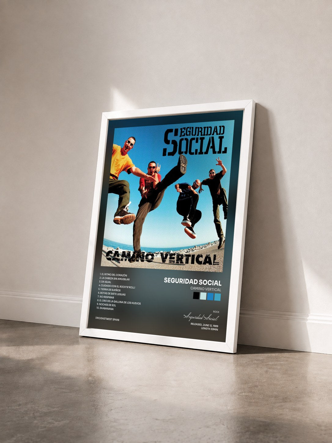 #blanc Tableau de l'album Camino Vertical de Seguridad Social vu de trois quarts, cadre blanc