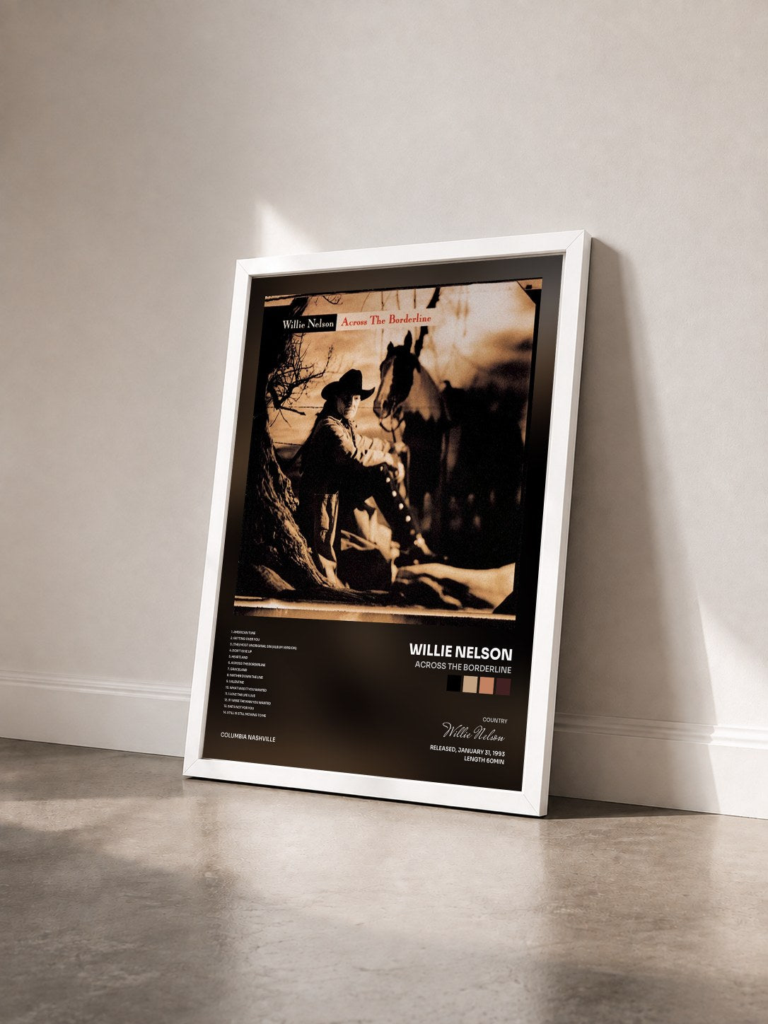#blanc Tableau de l'album Across The Borderline de Willie Nelson vu de trois quarts, cadre blanc
