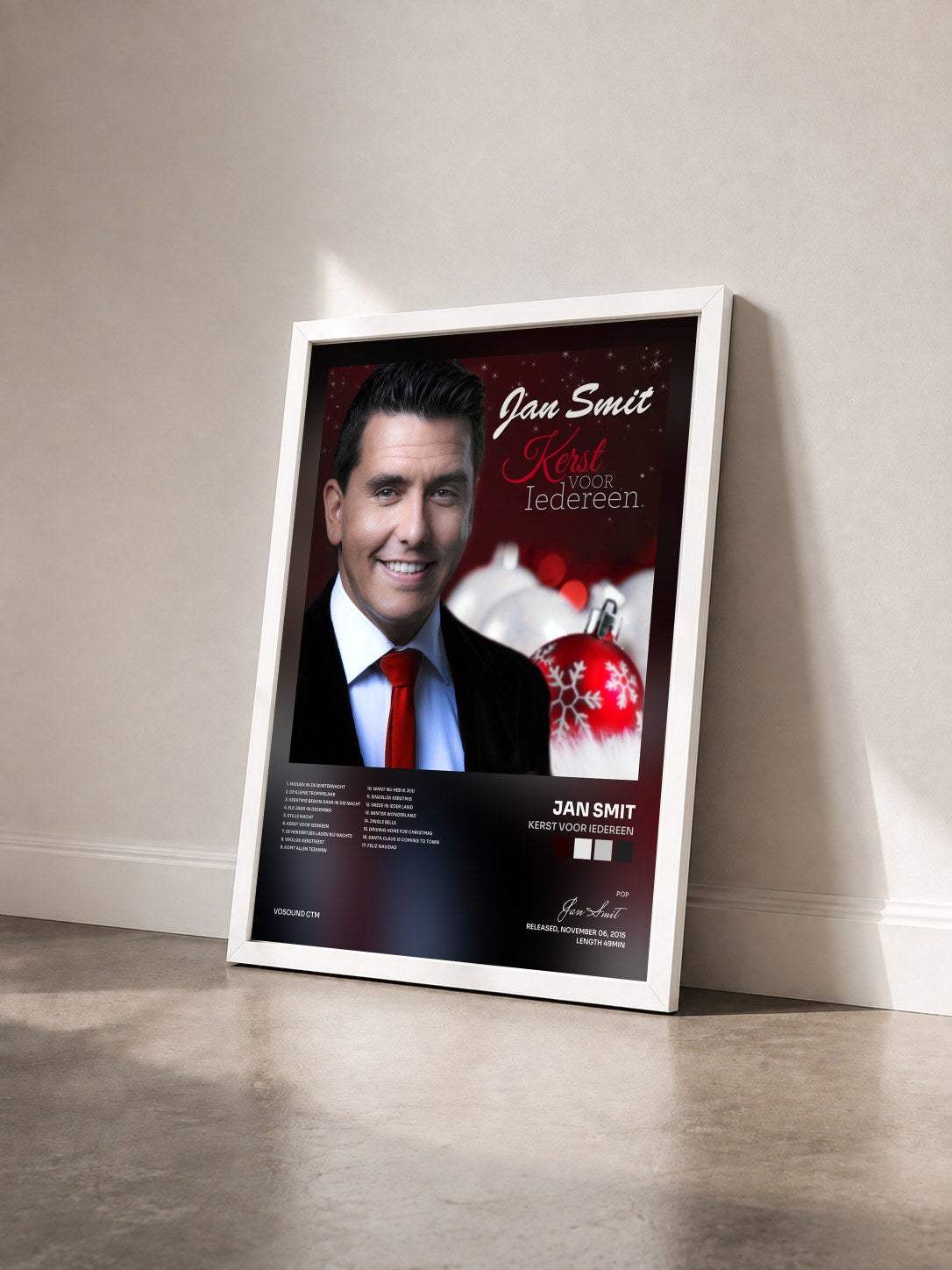 #blanc Tableau de l'album Kerst Voor Iedereen de Jan Smit vu de trois quarts, cadre blanc