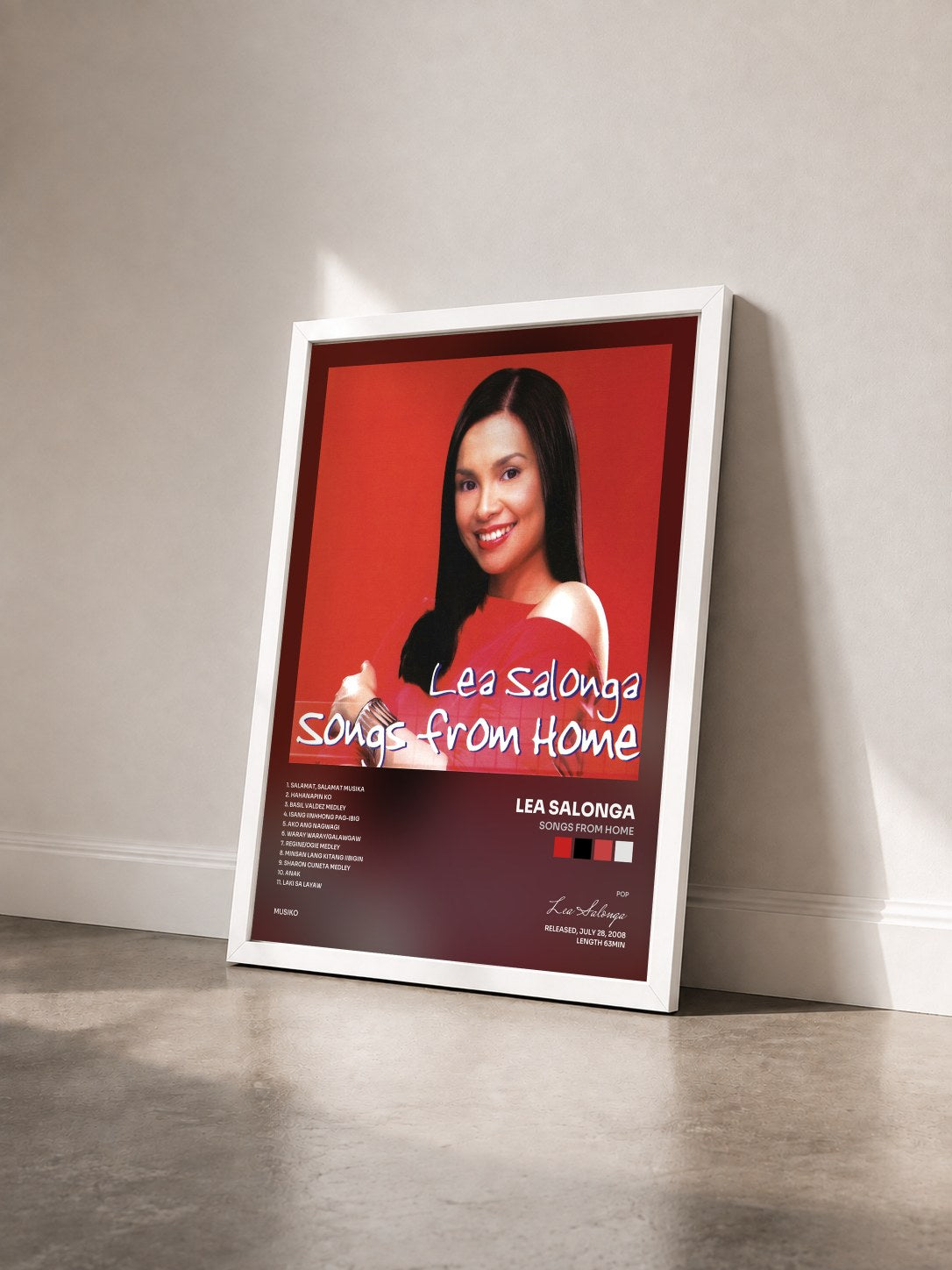 #blanc Tableau de l'album Songs From Home de Lea Salonga vu de trois quarts, cadre blanc