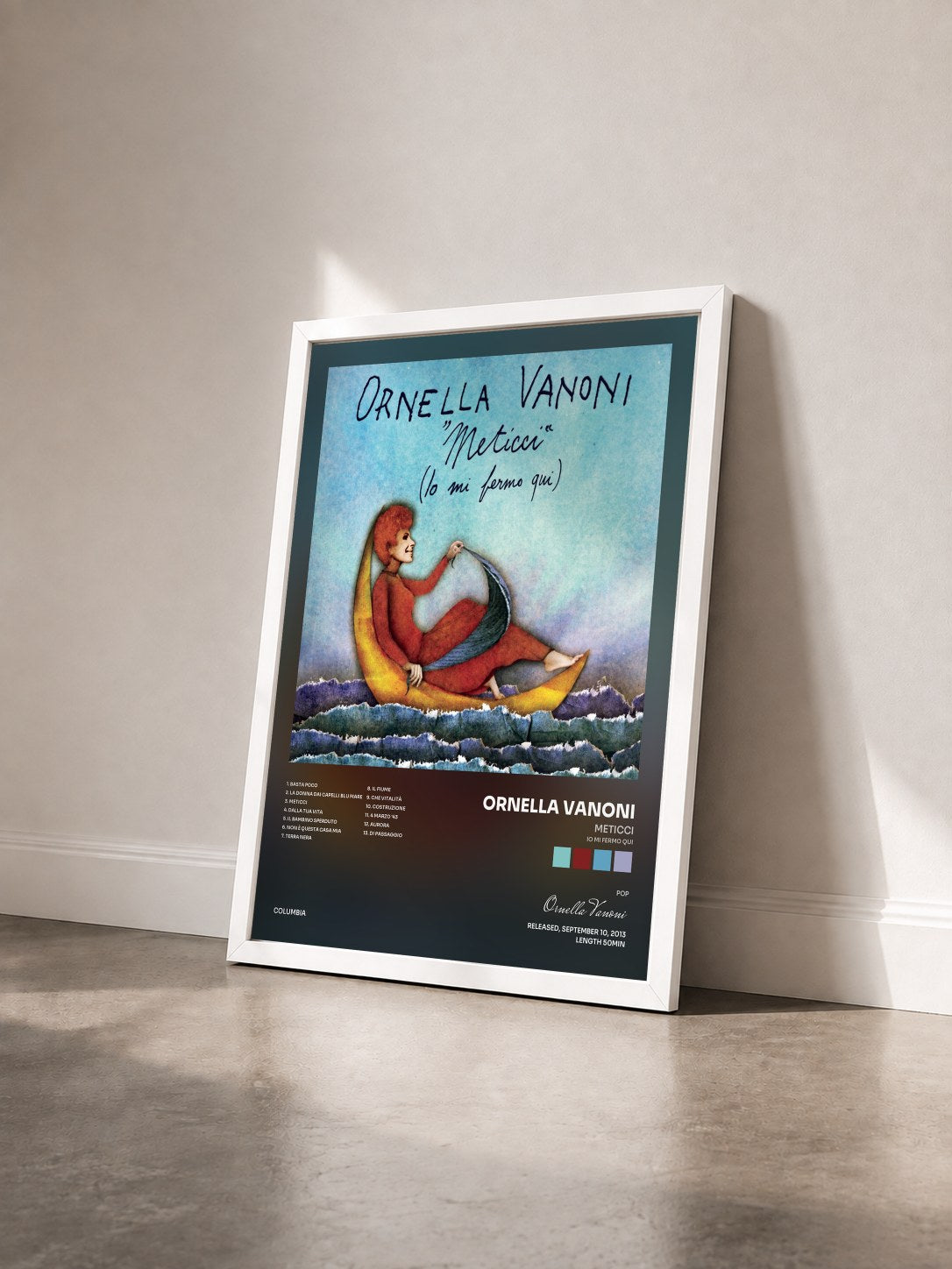 #blanc Tableau de l'album Meticci (Io mi fermo qui) de Ornella Vanoni vu de trois quarts, cadre blanc